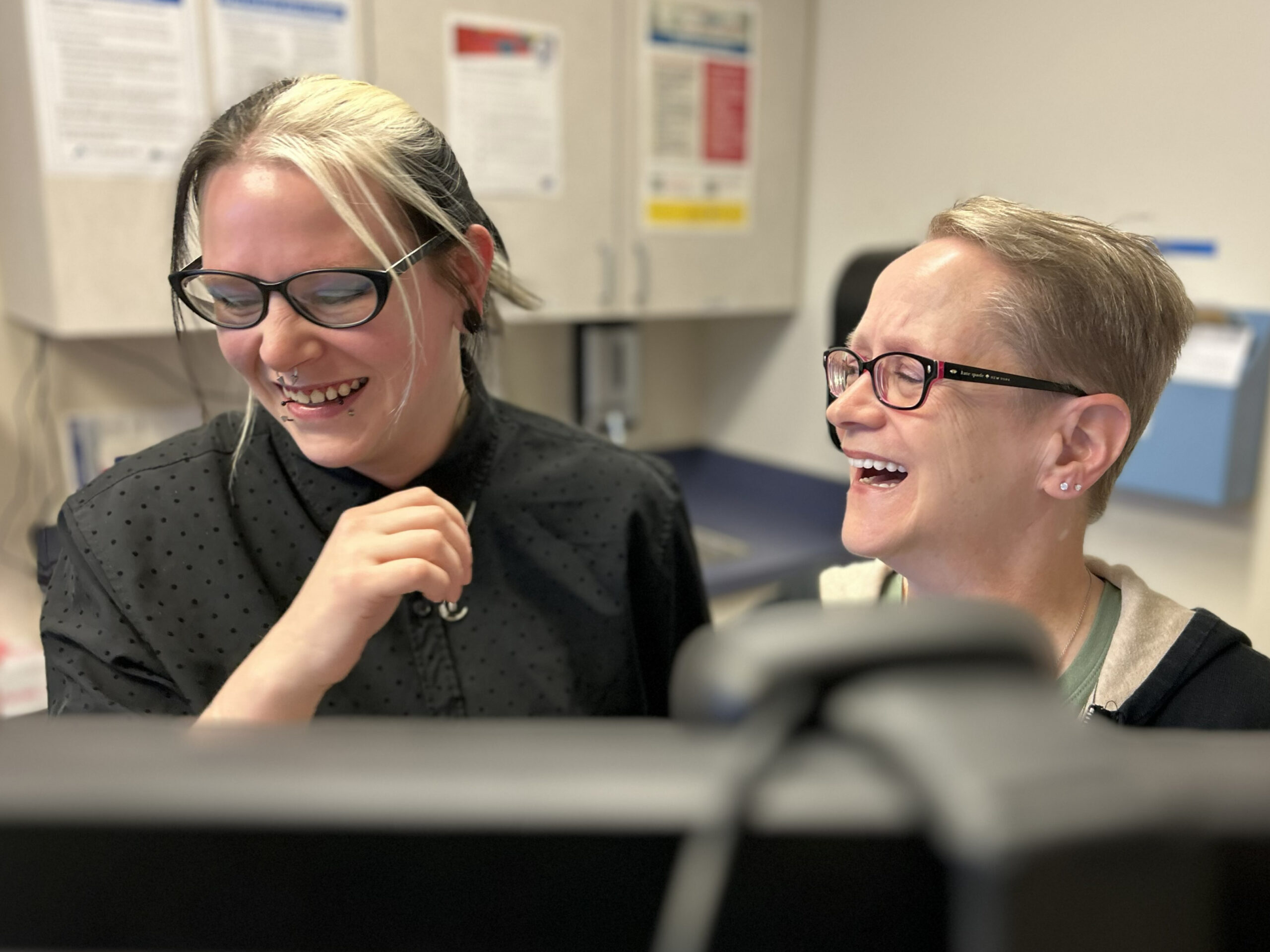 Medical Assistants Becca and Beverley share a laugh.